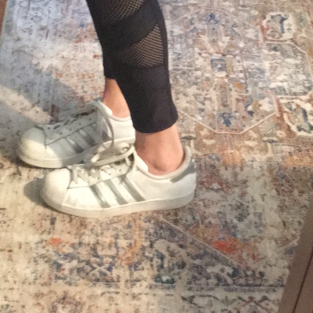 Adidas sneakers with silver stripe